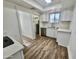 Modern kitchen with white shaker cabinets and stainless steel appliances at 2112 N 24Th Pl, Phoenix, AZ 85008