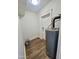 Laundry room with water heater and extra storage space at 2112 N 24Th Pl, Phoenix, AZ 85008