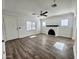 Living room with hardwood floors and fireplace at 2112 N 24Th Pl, Phoenix, AZ 85008