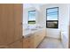 Spa-like bathroom with double vanity and a large window at 221 E 14Th St, Tempe, AZ 85281
