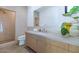 Modern bathroom with a walk-in shower and light wood vanity at 221 E 14Th St, Tempe, AZ 85281