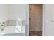 Bathroom with a soaking tub and a walk-in shower at 221 E 14Th St, Tempe, AZ 85281