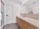 Modern bathroom boasts double vanity with light wood cabinets at 221 E 14Th St, Tempe, AZ 85281