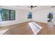 Light-filled bedroom with hardwood floors and ceiling fan at 221 E 14Th St, Tempe, AZ 85281