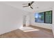 Spacious bedroom with a large window and light wood floors at 221 E 14Th St, Tempe, AZ 85281