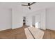 Light and airy bedroom with wood floors and access to closet and bathroom at 221 E 14Th St, Tempe, AZ 85281