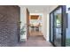Bright entryway with exposed brick and view into living area at 221 E 14Th St, Tempe, AZ 85281