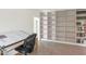 Bright home office features built-in shelving and a large drafting table at 221 E 14Th St, Tempe, AZ 85281