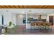 Modern kitchen with island, wood beams, and stainless steel appliances at 221 E 14Th St, Tempe, AZ 85281