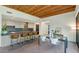 Open concept kitchen with breakfast bar, stainless steel appliances, and stylish backsplash at 221 E 14Th St, Tempe, AZ 85281