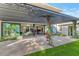 Outdoor patio with pergola offering views into the home's interior at 221 E 14Th St, Tempe, AZ 85281