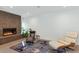 Cozy sitting area with fireplace and comfortable armchairs at 221 E 14Th St, Tempe, AZ 85281