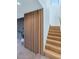 Elegant staircase with light wood and a modern wood wall at 221 E 14Th St, Tempe, AZ 85281