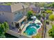 Aerial view of the house and the backyard with pool at 27486 N 89Th Dr, Peoria, AZ 85383