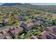 Aerial view of neighborhood with house and pool at 27486 N 89Th Dr, Peoria, AZ 85383