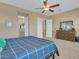 Main bedroom with ensuite bathroom access and walk-in closet at 27486 N 89Th Dr, Peoria, AZ 85383