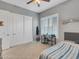 Bedroom with double closet and window seat at 27486 N 89Th Dr, Peoria, AZ 85383