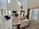 Spacious dining area with hardwood floors and large windows at 27486 N 89Th Dr, Peoria, AZ 85383