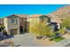 Two-story house with attached garage and mountain views at 27486 N 89Th Dr, Peoria, AZ 85383