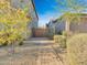Landscaped front yard with a walkway and gate at 27486 N 89Th Dr, Peoria, AZ 85383