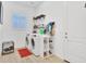 Bright laundry room with washer, dryer, and storage at 27486 N 89Th Dr, Peoria, AZ 85383