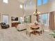 Spacious living area with high ceilings, wood floors and large windows at 27486 N 89Th Dr, Peoria, AZ 85383