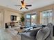 Living area with sliding glass doors leading to the backyard at 27486 N 89Th Dr, Peoria, AZ 85383