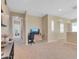 Spacious loft area with built-in desk and carpet flooring at 27486 N 89Th Dr, Peoria, AZ 85383