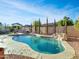 Resort style backyard with pool, spa, and patio area at 27486 N 89Th Dr, Peoria, AZ 85383