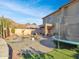 Spacious backyard with pool, spa, and trampoline at 27486 N 89Th Dr, Peoria, AZ 85383