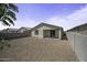 Spacious backyard with low-maintenance landscaping, perfect for outdoor activities and relaxation at 40015 W Crane Dr, Maricopa, AZ 85138