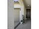 Inviting front entrance with decorative elements and a view of the garage door at 40015 W Crane Dr, Maricopa, AZ 85138