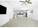 Open-concept living room showcases modern finishes and seamless flow into the kitchen at 40015 W Crane Dr, Maricopa, AZ 85138
