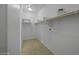 Spacious walk-in closet provides ample storage with shelving and a hanging rod at 40015 W Crane Dr, Maricopa, AZ 85138