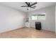 Simple bedroom with light wood floors and a bookcase at 433 W Ivanhoe Pl, Chandler, AZ 85225