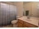 Well-lit bathroom featuring a stylish vanity, a modern faucet, and a shower-tub combination at 8598 E Saguaro Blossom Rd, Gold Canyon, AZ 85118