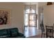 Welcoming entryway with tiled floors and decorative lighting that leads into the home's main living areas at 8598 E Saguaro Blossom Rd, Gold Canyon, AZ 85118
