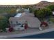 Single-story home with flat roof and desert landscaping at 1535 E Calavar Dr, Phoenix, AZ 85022