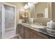 Bathroom with double vanity and granite countertop at 1535 E Calavar Dr, Phoenix, AZ 85022