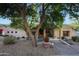 Bright and airy home with a welcoming front porch and mature trees at 1535 E Calavar Dr, Phoenix, AZ 85022