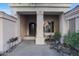 Welcoming front patio with seating area and a water feature at 1535 E Calavar Dr, Phoenix, AZ 85022