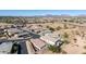 Aerial view of houses and neighborhood with mountain views at 1744 E 16Th Ave, Apache Junction, AZ 85119