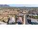 Aerial view of houses and neighborhood with mountain views at 1744 E 16Th Ave, Apache Junction, AZ 85119