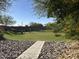 Community dog park with fenced-in area and grassy space at 1744 E 16Th Ave, Apache Junction, AZ 85119