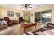 Bright living room with sliding glass doors leading to a patio at 1744 E 16Th Ave, Apache Junction, AZ 85119