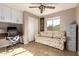 Home office with a desk, chair, and floral sofa at 1744 E 16Th Ave, Apache Junction, AZ 85119