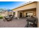 Covered patio with dining table, chairs, and a grill at 1744 E 16Th Ave, Apache Junction, AZ 85119