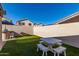 Relaxing backyard with putting green and picnic table at 20020 N 21St St, Phoenix, AZ 85024