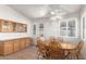 Charming dining area with wood table and chairs, adjacent to kitchen at 20020 N 21St St, Phoenix, AZ 85024