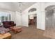 Living room with access to a home office and entryway at 20020 N 21St St, Phoenix, AZ 85024